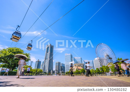 Yokohama cityscape in Japan...View of the ropeway and Yokohama Landmark Tower from Canal Park Station and Canal Park Yokohama cityscape in Japan...View of the ropeway and Yokohama Landmark Tower from Canal Park Station and Canal Park 130480282