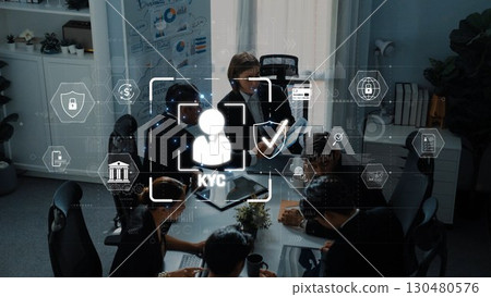 Business Meeting Focused on Know Your Customer (KYC) Processes with Digital Technology and Team Collaboration in Modern Office Environment. Raster Business Meeting Focused on Know Your Customer (KYC) Processes with Digital Technology and Team Collaboration in Modern Office Environment. Raster 130480576