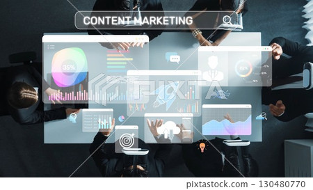 Business Meeting with Digital Marketing Concepts, Charts, and Data Visualization in a Modern Office Environment Using Innovative Technology Tools. Raster 130480770
