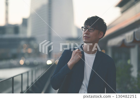 A man walking in the city A man walking in the city 130482251