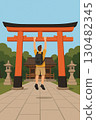 Annoying tourists hanging from the shrine's torii gate 130482345