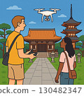 Tourists taking drone aerial photos of shrines and temples 130482347