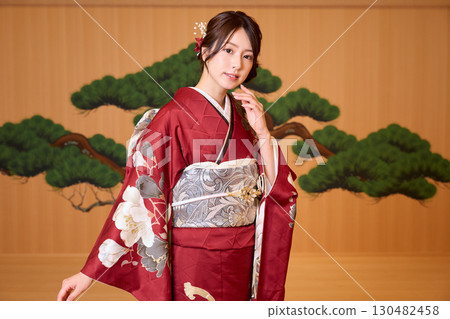 Japanese woman in furisode kimono standing on the Noh stage Japanese woman in furisode kimono standing on the Noh stage 130482458