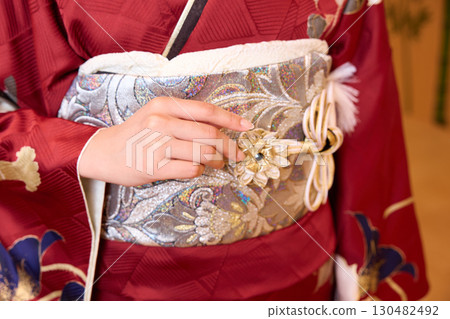 Japanese woman in furisode kimono standing on the Noh stage Japanese woman in furisode kimono standing on the Noh stage 130482492