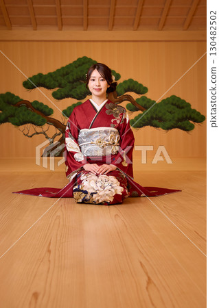 Japanese woman in furisode kimono standing on the Noh stage Japanese woman in furisode kimono standing on the Noh stage 130482502