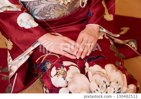 Japanese woman in furisode kimono standing on the Noh stage 130482511