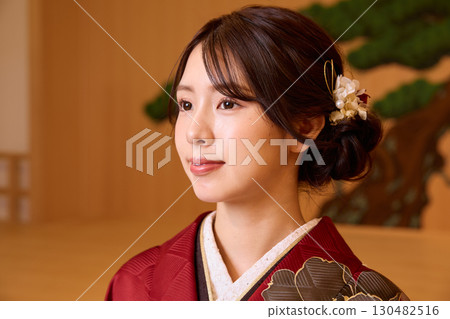 Japanese woman in furisode kimono standing on the Noh stage Japanese woman in furisode kimono standing on the Noh stage 130482516