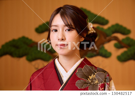 Japanese woman in furisode kimono standing on the Noh stage Japanese woman in furisode kimono standing on the Noh stage 130482517