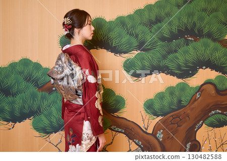 Japanese woman in furisode kimono standing on the Noh stage Japanese woman in furisode kimono standing on the Noh stage 130482588