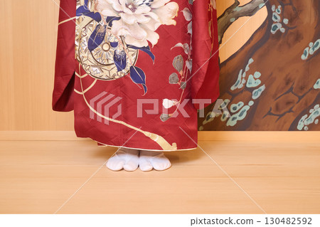 Japanese woman in furisode kimono standing on the Noh stage 130482592