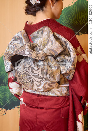 Japanese woman in furisode kimono standing on the Noh stage Japanese woman in furisode kimono standing on the Noh stage 130482602