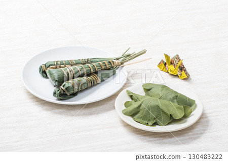 盤子裡的千捲和柏餅,兒童節,男孩節,圖像材料 盤子裡的千捲和柏餅,兒童節,男孩節,圖像材料 130483222