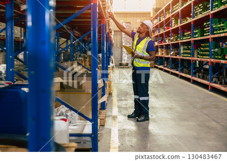 warehouse staff worker man work in cargo warehouse for logistics shipping products supply industry 130483467