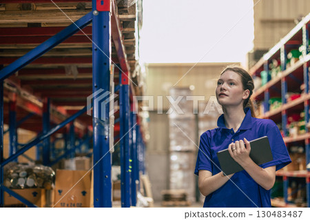 young teen women warehouse worker in warehouse cargo logistics shipping supply chain industry young teen women warehouse worker in warehouse cargo logistics shipping supply chain industry 130483487