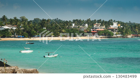Coastal Scene with Tropical Vibes and Idyllic Atmosphere Coastal Scene with Tropical Vibes and Idyllic Atmosphere 130483499