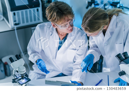 Scientist working in science lab. Medical lab people, Pharmaceutical medicine research laboratory. 130483659