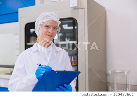 science people, lab technician, medical lab people hand holding check board for medical information science people, lab technician, medical lab people hand holding check board for medical information 130483665