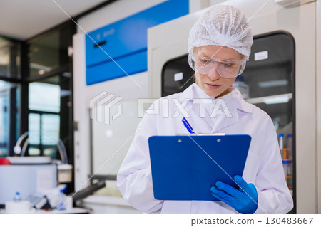 Closeup science doctor medical people hand holding chart sheet check board for medical information 130483667