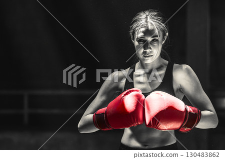 Portrait Asian women boxer, muay thai female fighter, Women boxing sport, kick boxing female Portrait Asian women boxer, muay thai female fighter, Women boxing sport, kick boxing female 130483862