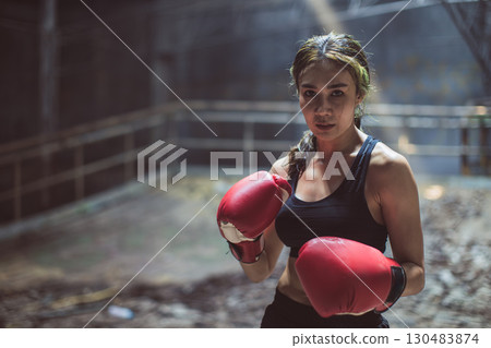 Thai boxing, Portrait muay thai fighter, Young women boxer, kick boxing female ,Asian martial arts Thai boxing, Portrait muay thai fighter, Young women boxer, kick boxing female ,Asian martial arts 130483874