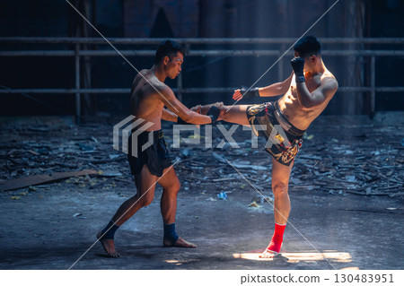 Thai boxing, Muay thai fighter boxer action in kick boxing in ruin building ,Asian martial arts 130483951