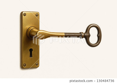 An antique metal key in a keyhole door. An antique metal key in a keyhole door. 130484736