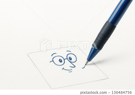 A blue pen draws a smiling face with glasses. Space for text. A blue pen draws a smiling face with glasses. Space for text. 130484756
