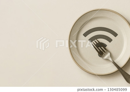 A plate with a Wi-Fi symbol and a plug. Space for text. A plate with a Wi-Fi symbol and a plug. Space for text. 130485099