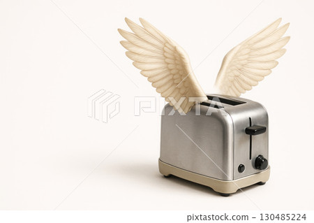 A toaster with wings is ready to fly. Space for text. 130485224