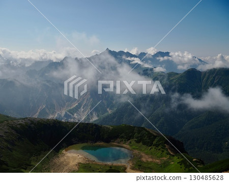 View of Washu Pond and Mt. Yari from the summit of Mt. Washu 130485628
