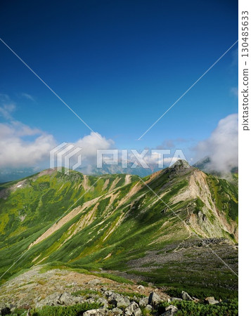 View of Mount Mitsumatarenge, Mount Sugoroku, and Mount Kurobegoro from the summit of Mount Washu 130485633