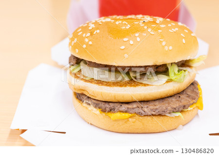 Delicious hamburgers Delicious hamburgers 130486820