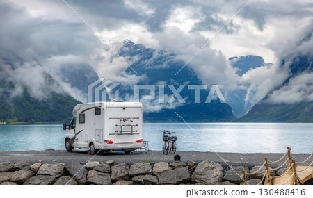 Family vacation travel RV, holiday trip in motorhome, Caravan car Vacation. Beautiful Nature Norway. 130488416