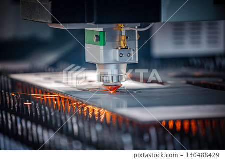CNC Laser cutting of metal, modern industrial technology. CNC Laser cutting of metal, modern industrial technology. 130488429