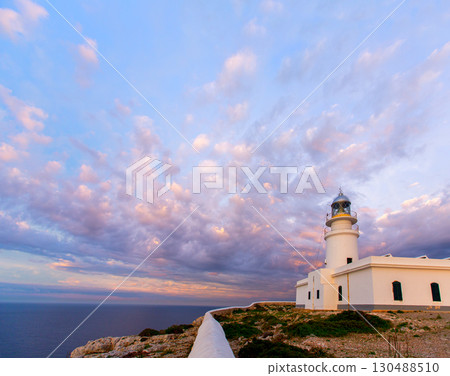 Menorca sunset at Faro de Caballeria Lighthouse Menorca sunset at Faro de Caballeria Lighthouse 130488510