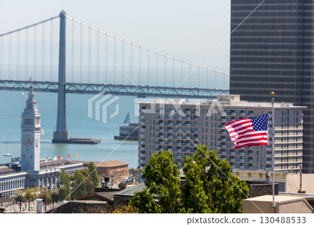 San Francisco USA American Flag Bay Bridge and Clock tower 130488533