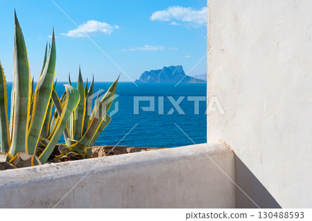 Moraira Alicante view mediterranean white house and agave Moraira Alicante view mediterranean white house and agave 130488593