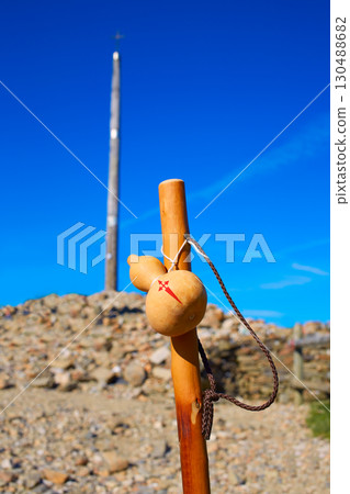 Cruz de Ferro at Saint James Way pilgrim staff 130488682