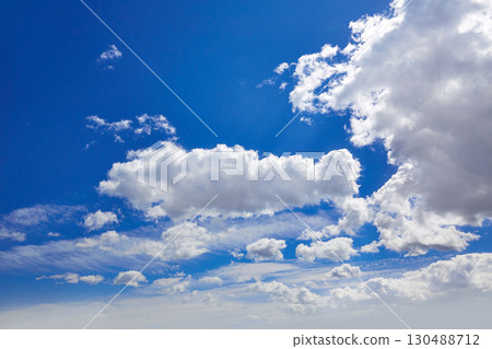 Blue sky with clouds in a sunny day Blue sky with clouds in a sunny day 130488712