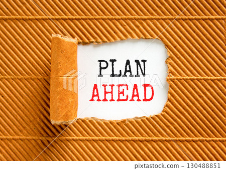 Plan ahead symbol. Concept word Plan ahead on beautiful white paper. Beautiful brown paper background. Business plan ahead concept. Copy space. 130488851