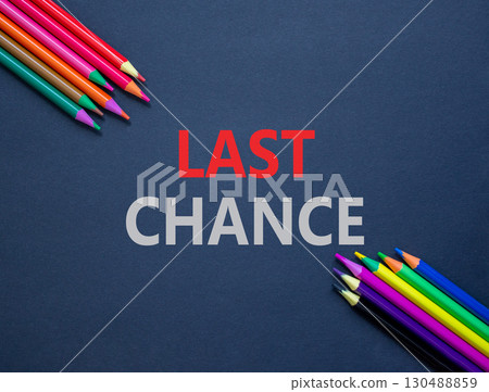Last chance symbol. Concept word Last chance on beautiful black paper. Colored pencils. Beautiful black paper background. Business last chance concept. Copy space. Last chance symbol. Concept word Last chance on beautiful black paper. Colored pencils. Beautiful black paper background. Business last chance concept. Copy space. 130488859