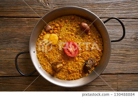 Baked rice Paella recipe from Spain 130488884