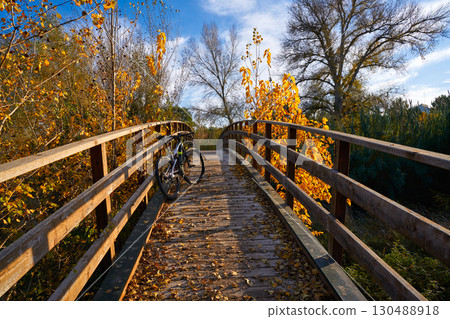 Autumn sunset bike on bridge Parque de Turia 130488918
