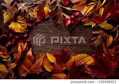 Autumn fall frame golden red leaves on wood 130488953