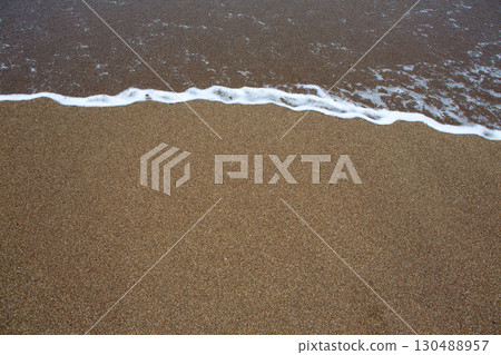 beach tropical with brown sand and clear water 130488957