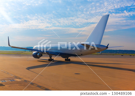 Aircraft in airport preparing to take off 130489106