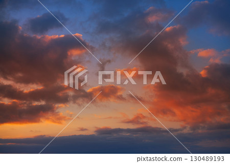 Sunset sky clouds orange and blue Sunset sky clouds orange and blue 130489193