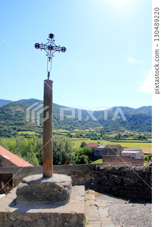 Way of Saint James cross stone pilgrims statue 130489220