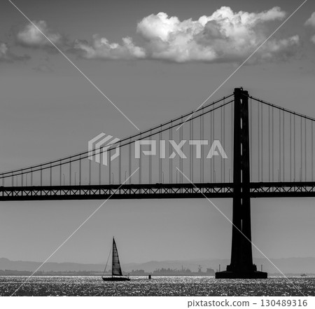 San Francisco Bay bridge sailboat from Pier 7 California 130489316