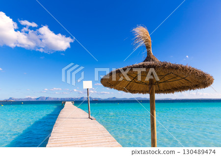 Mallorca Platja de Alcudia beach pier in Majorca 130489474